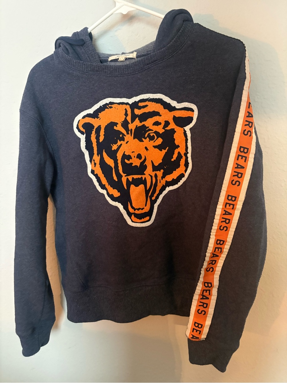 Junk Food Clothing Navy Sweatshirt with Orange Bear Graphic
